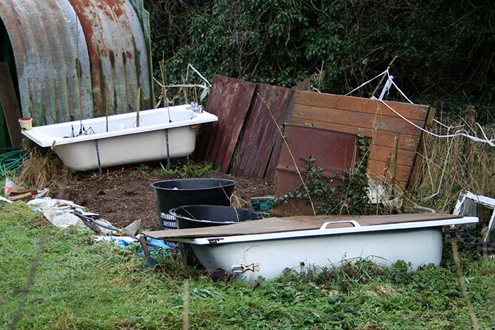 Photograph of old baths and doors on allotment. Copyright Kim Crowder